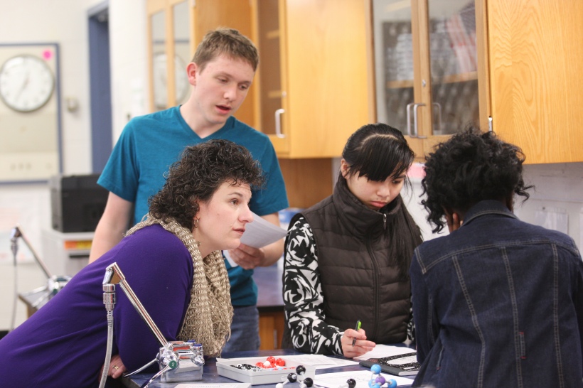 New Jersey Teaching Fellow Jen Lee works with her students on a lab exercise at Pemberton High School in Pemberton, N.J.