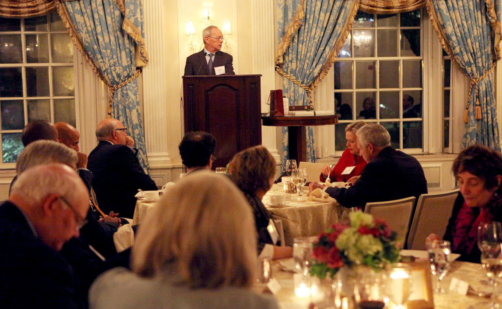 MIT President Reif accepts the WW Taplin Award at a dinner in October.